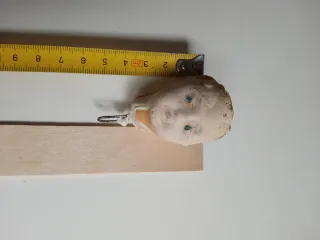 Teste di bambole antiche