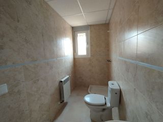 Casa adosada en venta en Tomelloso