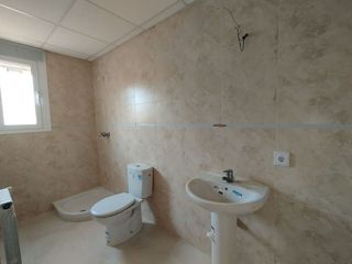 Casa adosada en venta en Tomelloso