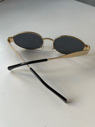 Gafas de sol vintage doradas y negras