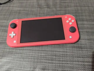 Nintendo Switch Lite Coral + Mario Party