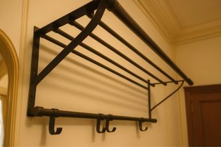 Perchero de pared metálico negro