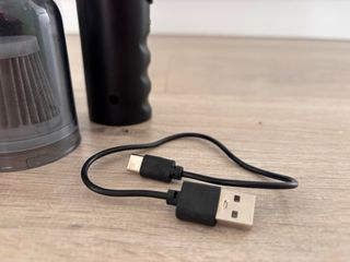 Mini aspirador portátil