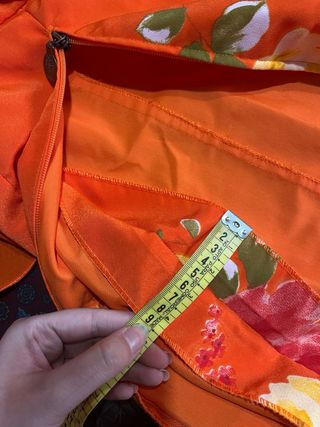 Traje de flamenca naranja con flores