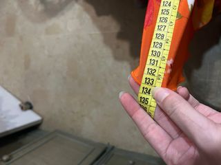 Traje de flamenca naranja con flores