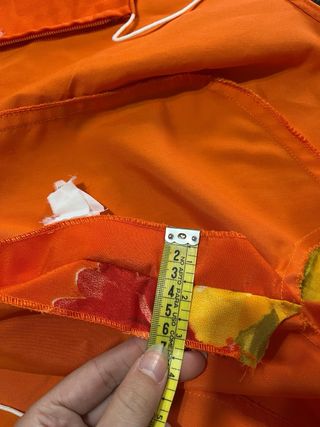 Traje de flamenca naranja con flores