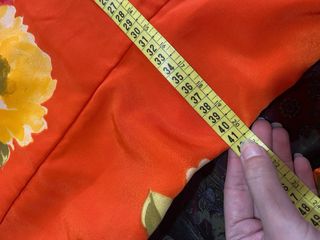 Traje de flamenca naranja con flores