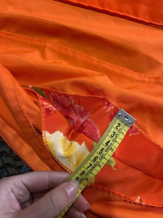 Traje de flamenca naranja con flores