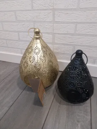 Portavelas metálicos dorados y negros