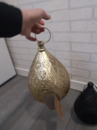 Portavelas metálicos dorados y negros