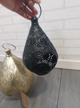 Portavelas metálicos dorados y negros