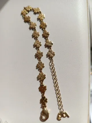 Pulsera Purificación García Flores Dorada