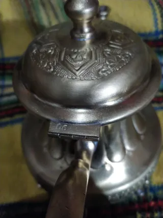 antigua metal labrado con sello maziza