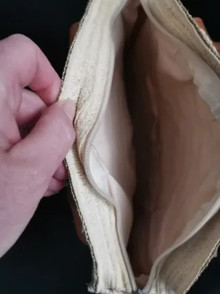 Bolso redondo de paja con asas de cuero