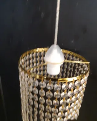 Lampadario in colore oro con strass