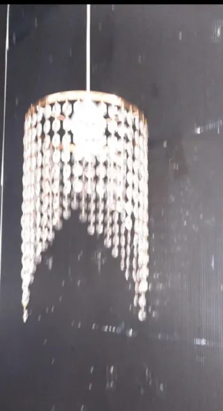 Lampadario in colore oro con strass