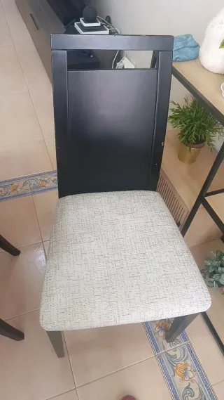 Mesa de comedor y 6 sillas negras