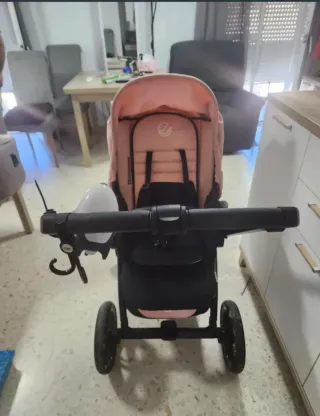 Cochecito de bebé capota rosa y gris