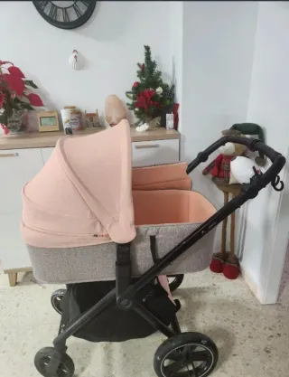 Cochecito de bebé capota rosa y gris
