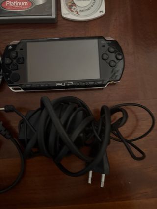 3 PSP + 2 Fotocamere + 4 Giochi + Film