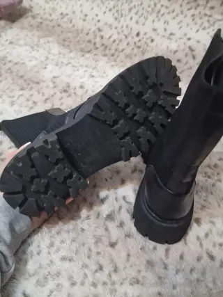 Botas negras con cremallera