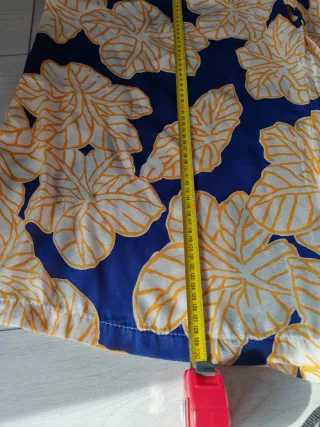 Tuta elegante blu e gialla