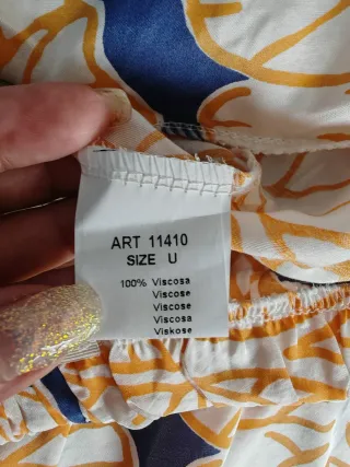 Tuta elegante blu e gialla