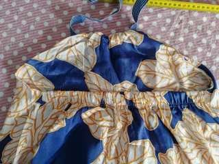 Tuta elegante blu e gialla