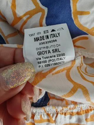 Tuta elegante blu e gialla