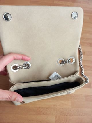 Bolso Parfois beige tachuelas estrella