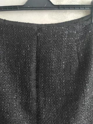 Falda corta negra brillante talla 44