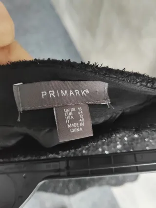 Falda corta negra brillante talla 44