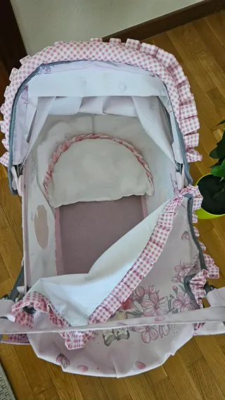 Cochecito de muñecas rosa