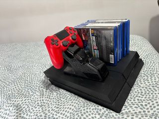 PS4 Negra 1TB + Mando + Cargador y 8 Juegos
