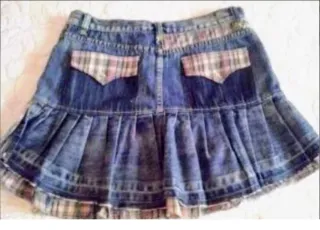 Falda vaquera por detras es mas larga