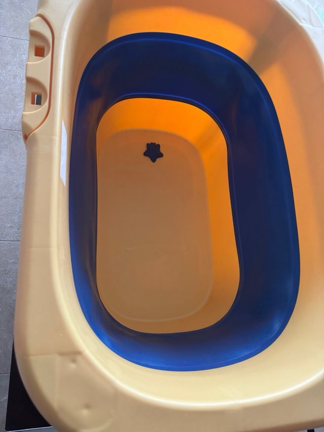 Bañera bebé plegable amarilla y azul