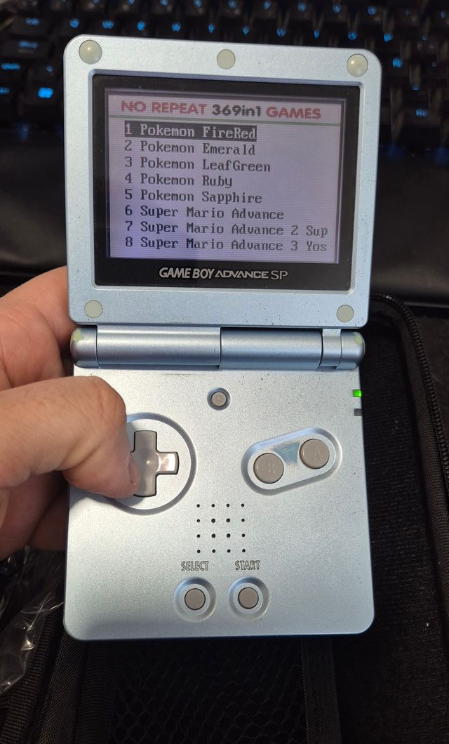 Nintendo Game Boy Advance SP Azul plata y juegos