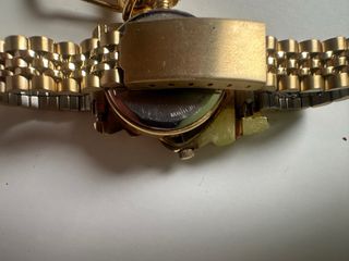 Reloj Dorado con Esfera Naranja de Winnie The Pooh