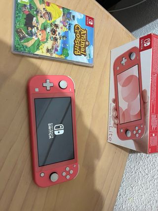 Nintendo Switch Lite Coral + Juego
