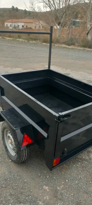 Remolque de carga tramed.