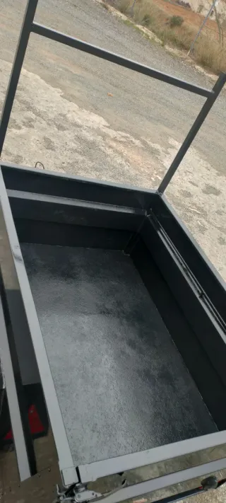 Remolque de carga tramed.