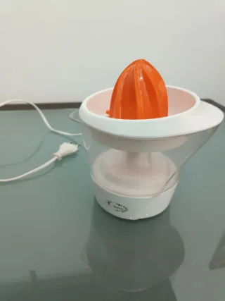 Exprimidor eléctrico Rotex