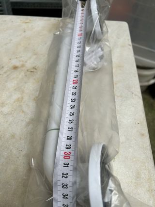 Agarrador de baño blanco y verde