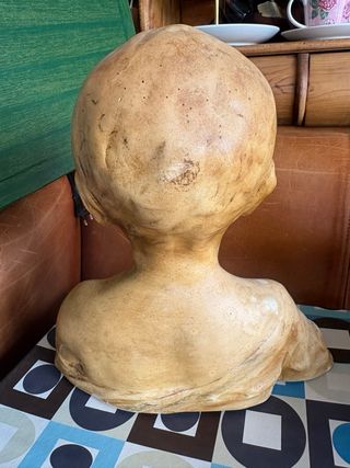 Busto antiguo de niño