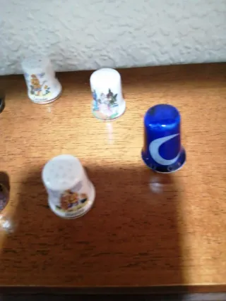 Collezione di ditali decorativi