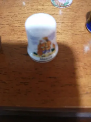 Collezione di ditali decorativi