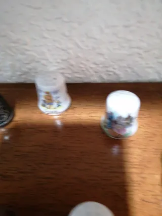 Collezione di ditali decorativi