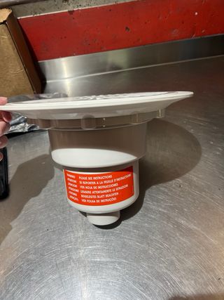 Sumidero circular blanco