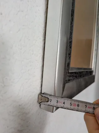 Marcos de fotos plateados y marrones