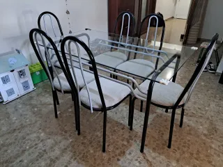 Mesa de cristal y metal con 6 sillas